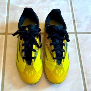 Boy adidas soccer cleats - much brighter yellow than pictured